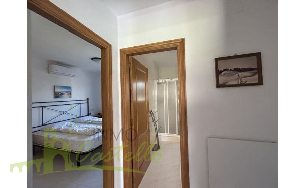Pasillo a los dormitorios y baño