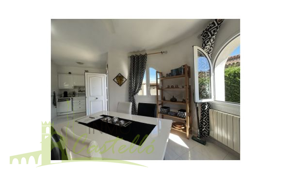 Salon comedor con cocina integrada