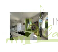 Salon comedor con cocina integrada