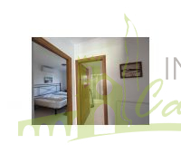 Pasillo a los dormitorios y baño