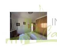 Dormitorio doble con armarios empotrados