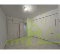 Dormitorio doble con armarios empotrados